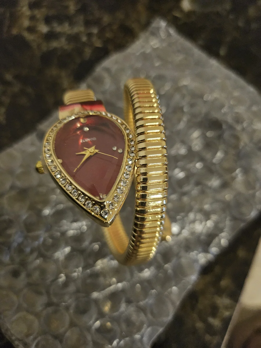 & Other Stories Gold Coil Bangle Watch with Red Teardrop Dial